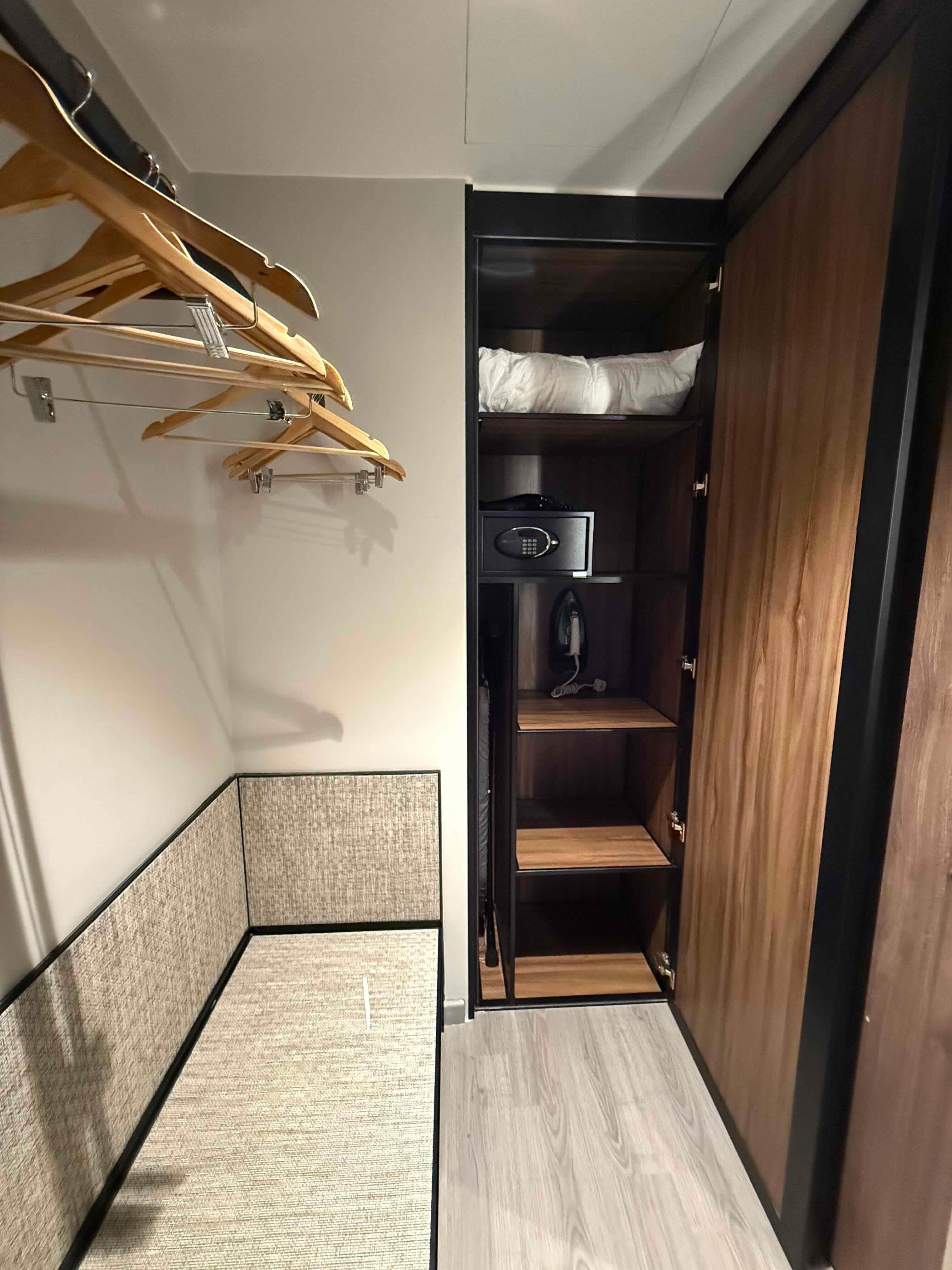 Wardrobe and luggage area next to the toilet (it's in the bedroom)