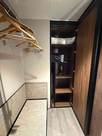 Wardrobe and luggage area next to the toilet (it's in the bedroom)