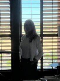 A beautiful woman in the room.