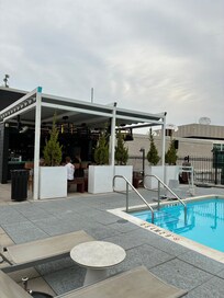 During the evening, a movie was shown near the pool.