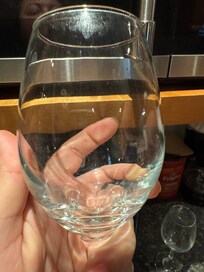 Dirty lip prints on wine glasses