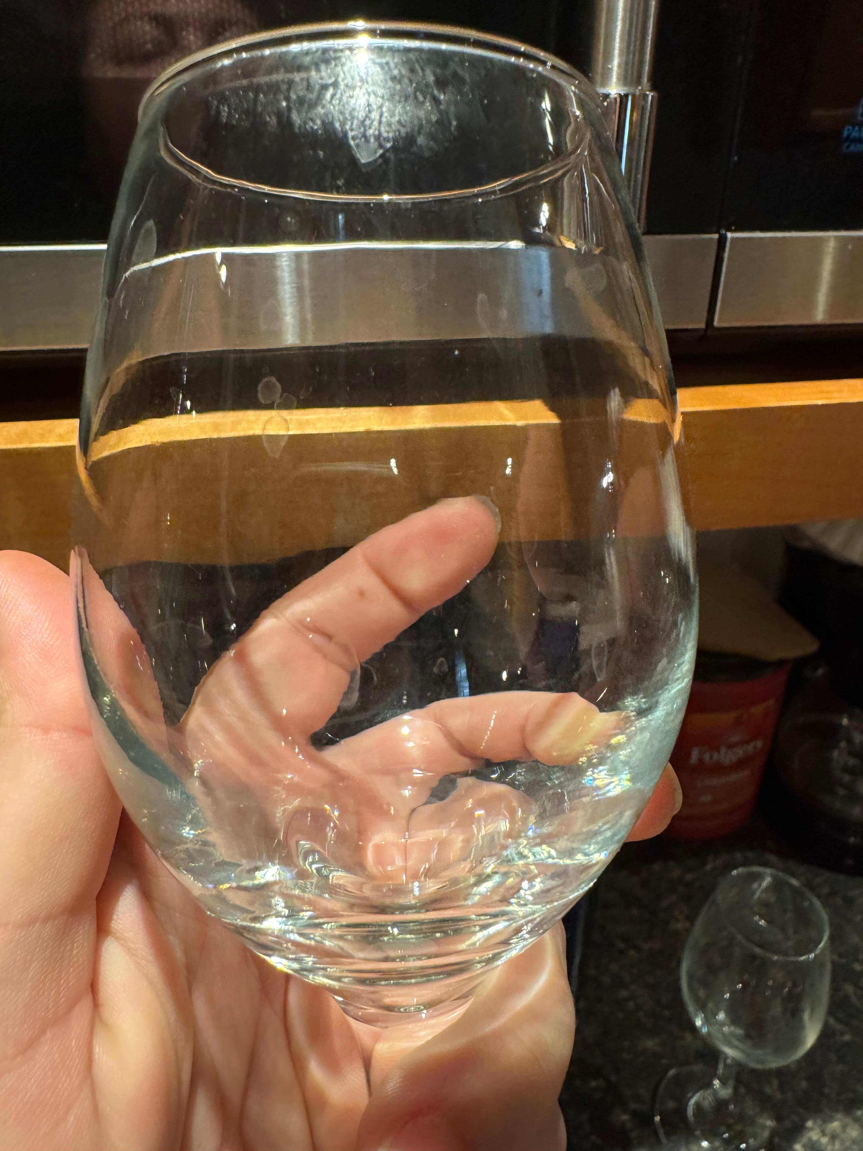 Dirty lip prints on wine glasses