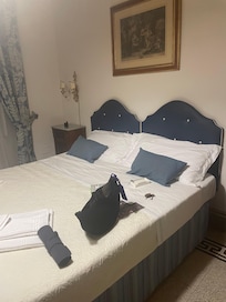 Simple & clean bed. (More pillows & blankets are available)