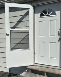 Rear storm door