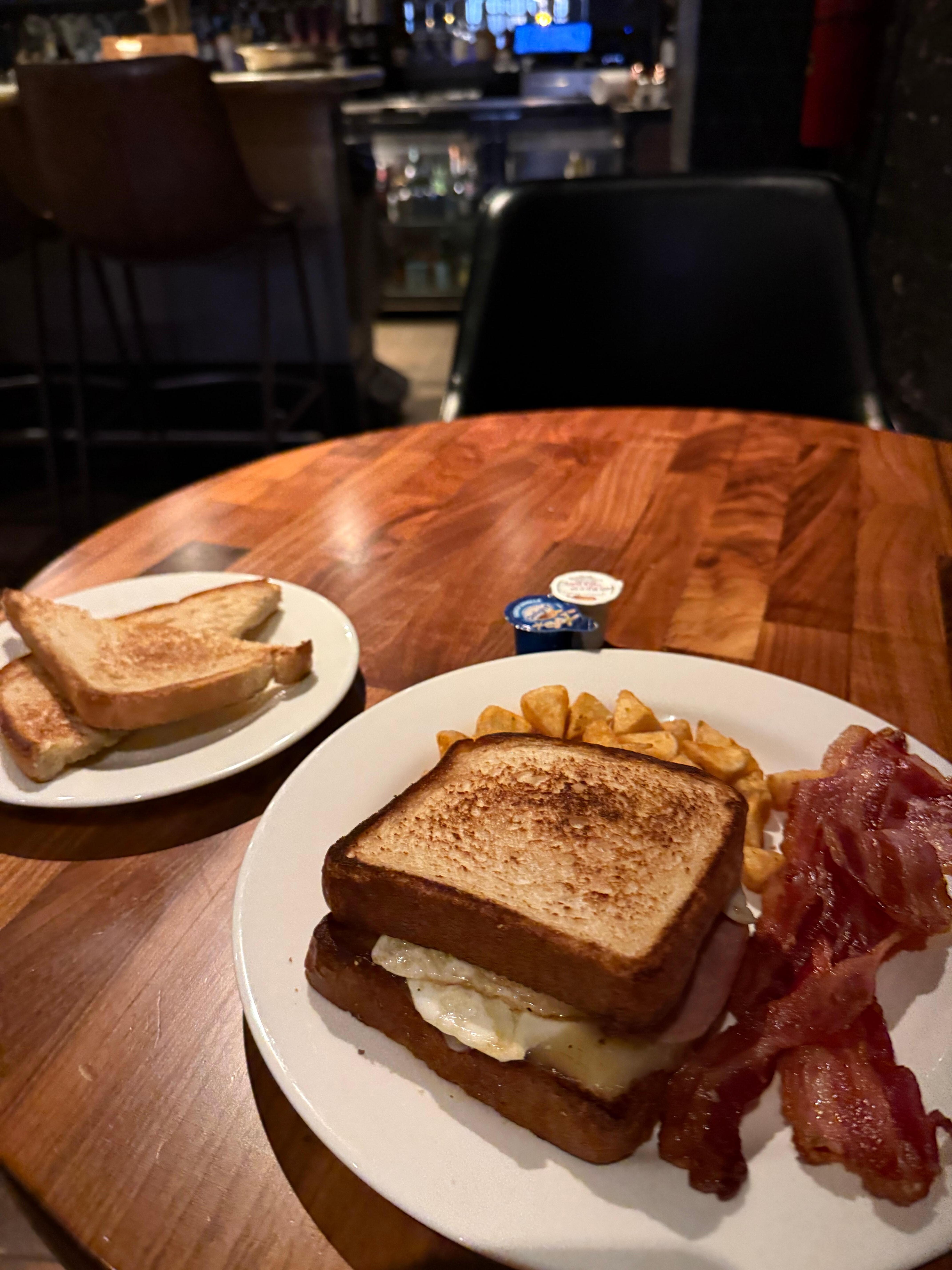 Ordered 2 eggs over easy, toast, bacon, and potatoes but got this