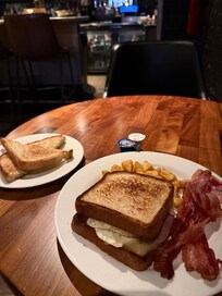 Ordered 2 eggs over easy, toast, bacon, and potatoes but got this