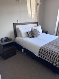 Main bedroom
Has a wardrobe
Full length mirror on the wall
TV on the wall