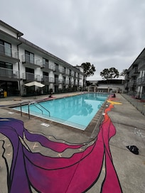 Artists painting around pool area. Pool was temporarily closed for this but it looks very inviting