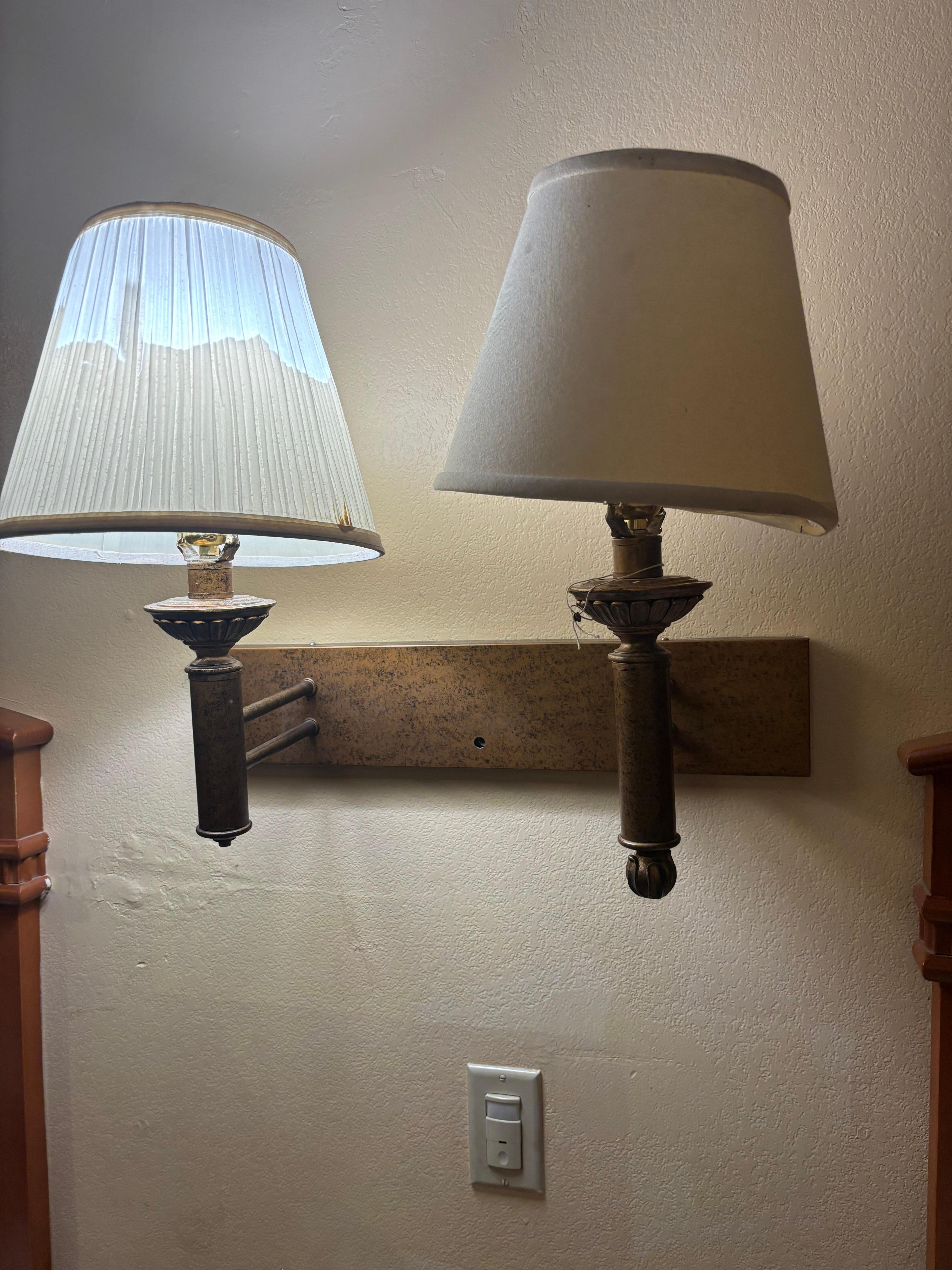 Lights not working, dirty and ripped lamp covers and broken on the bottom