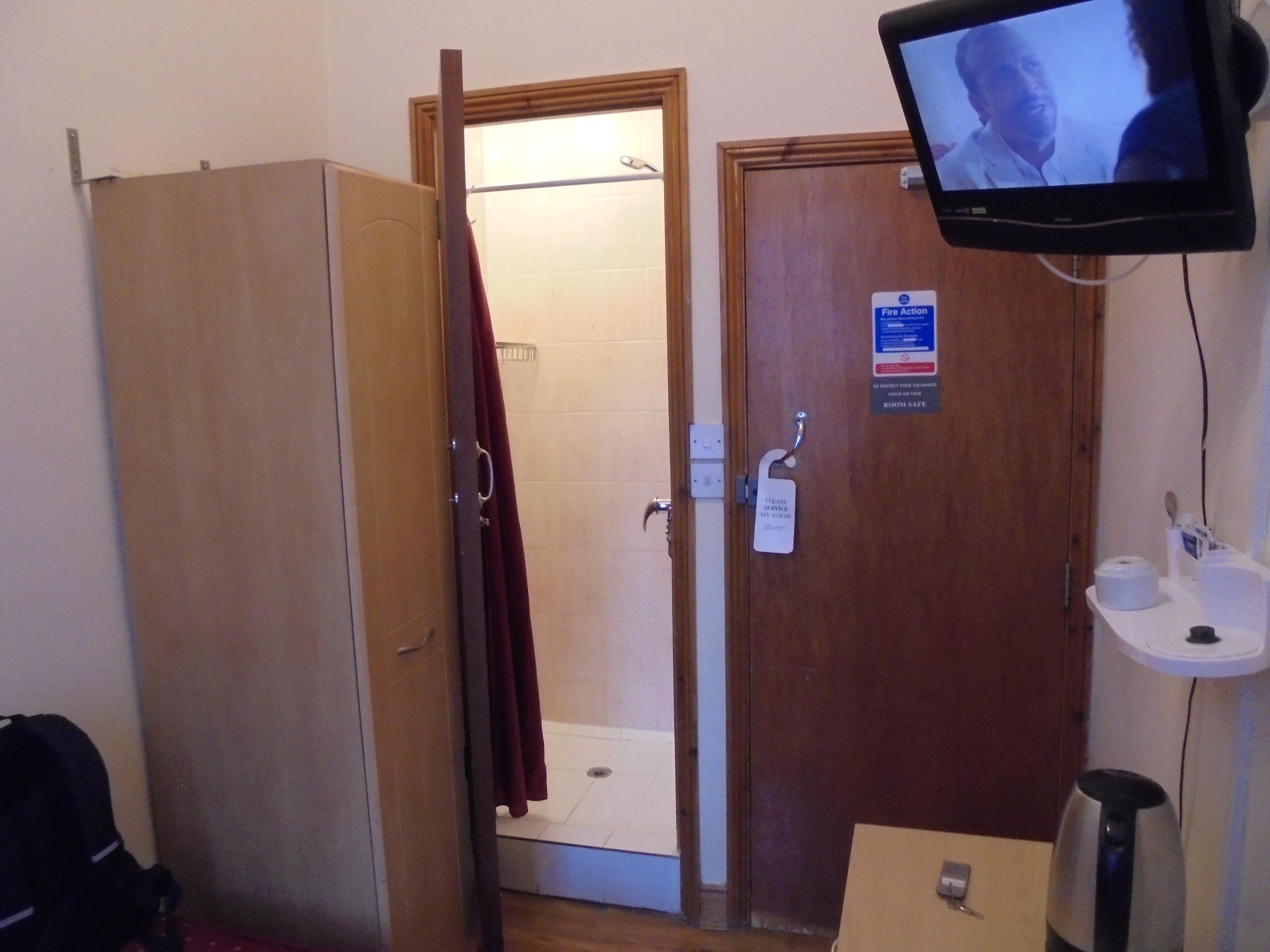 Wardrobe with a safe, Shower, Kettle. Tea & Coffee making.