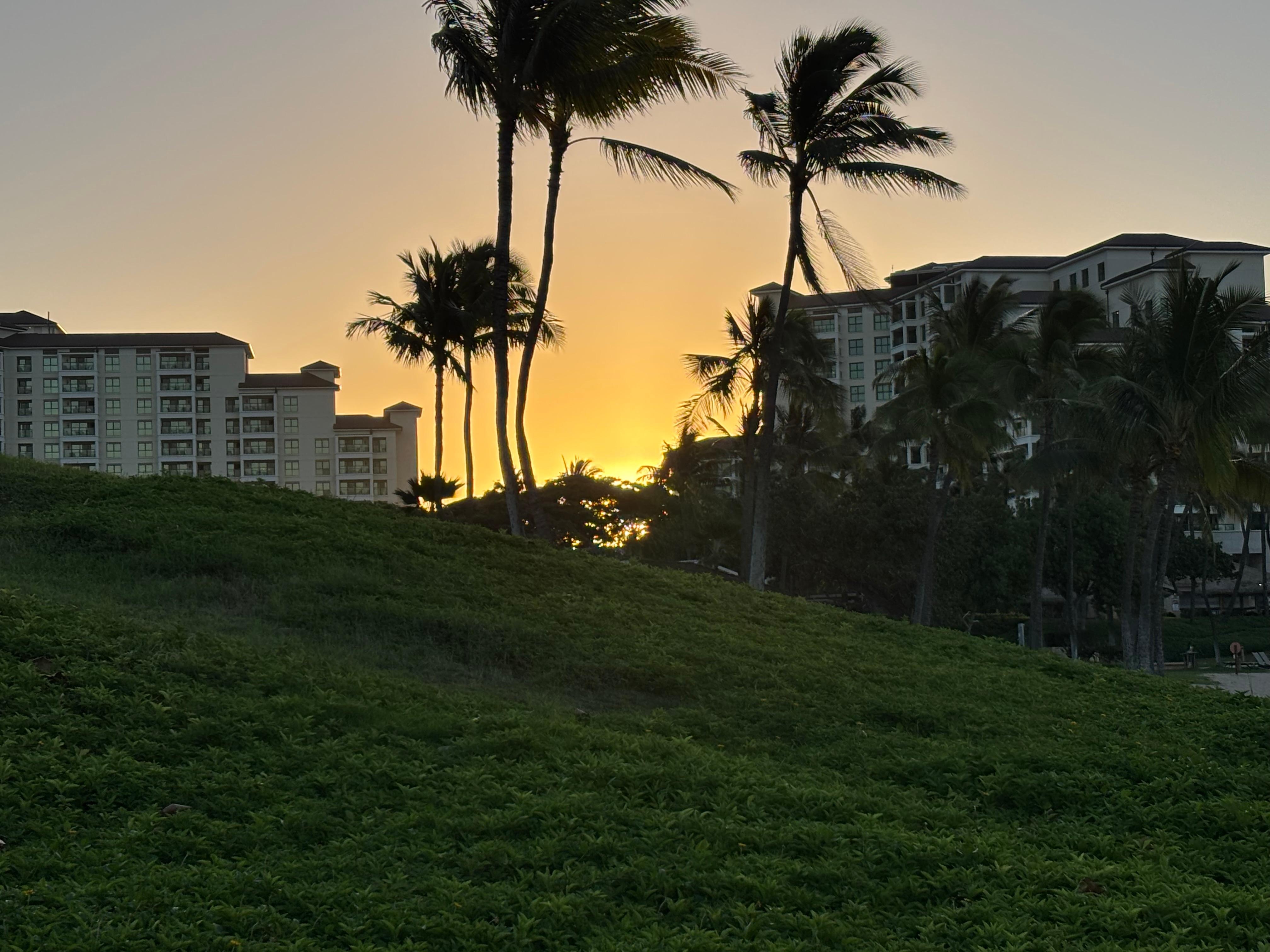 Sunrise. Condos are on the left, Marriott on the right, and the ocean is behind. 