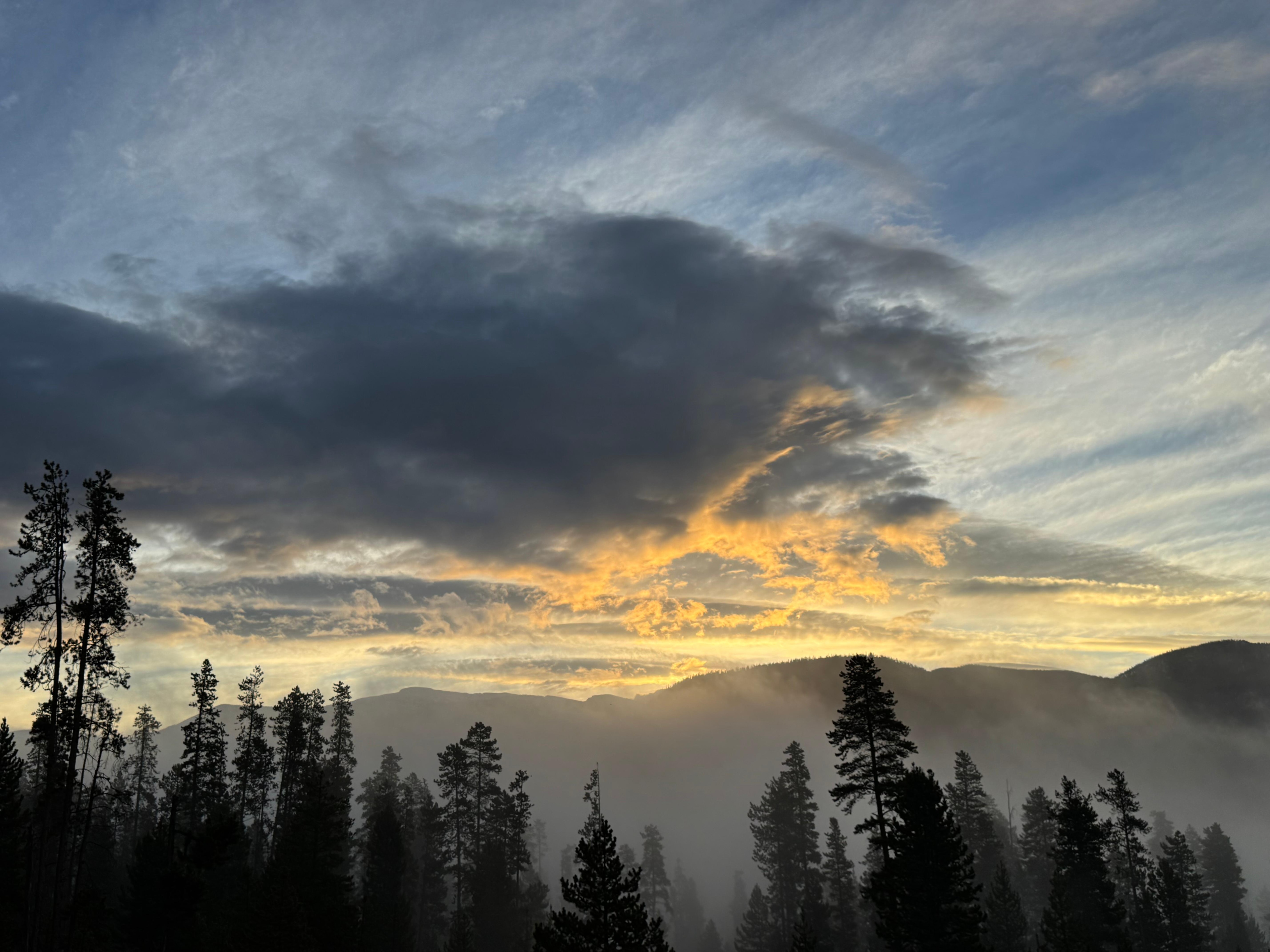 Sunrise with fog over lake