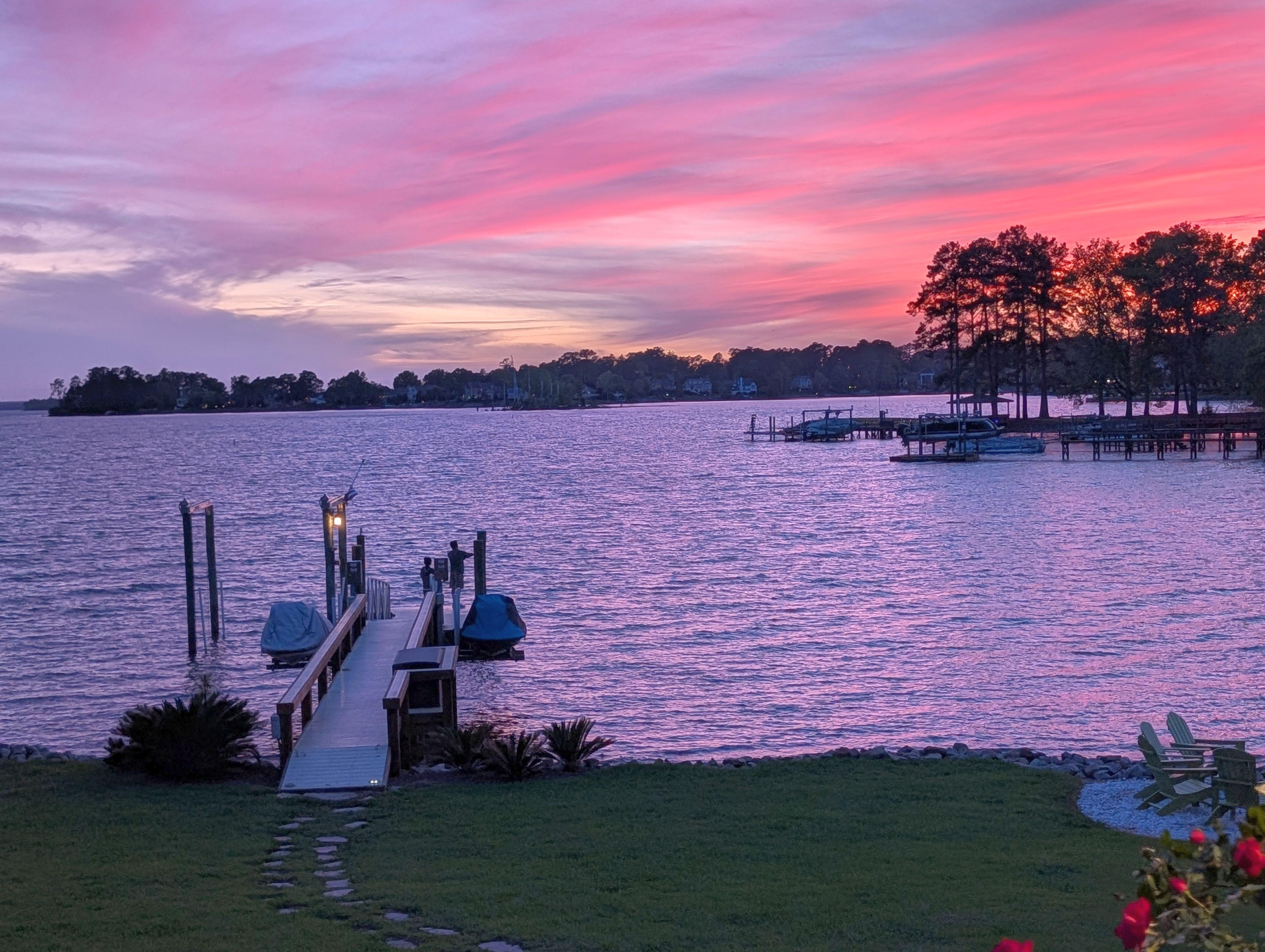 Pier and beach at sunset