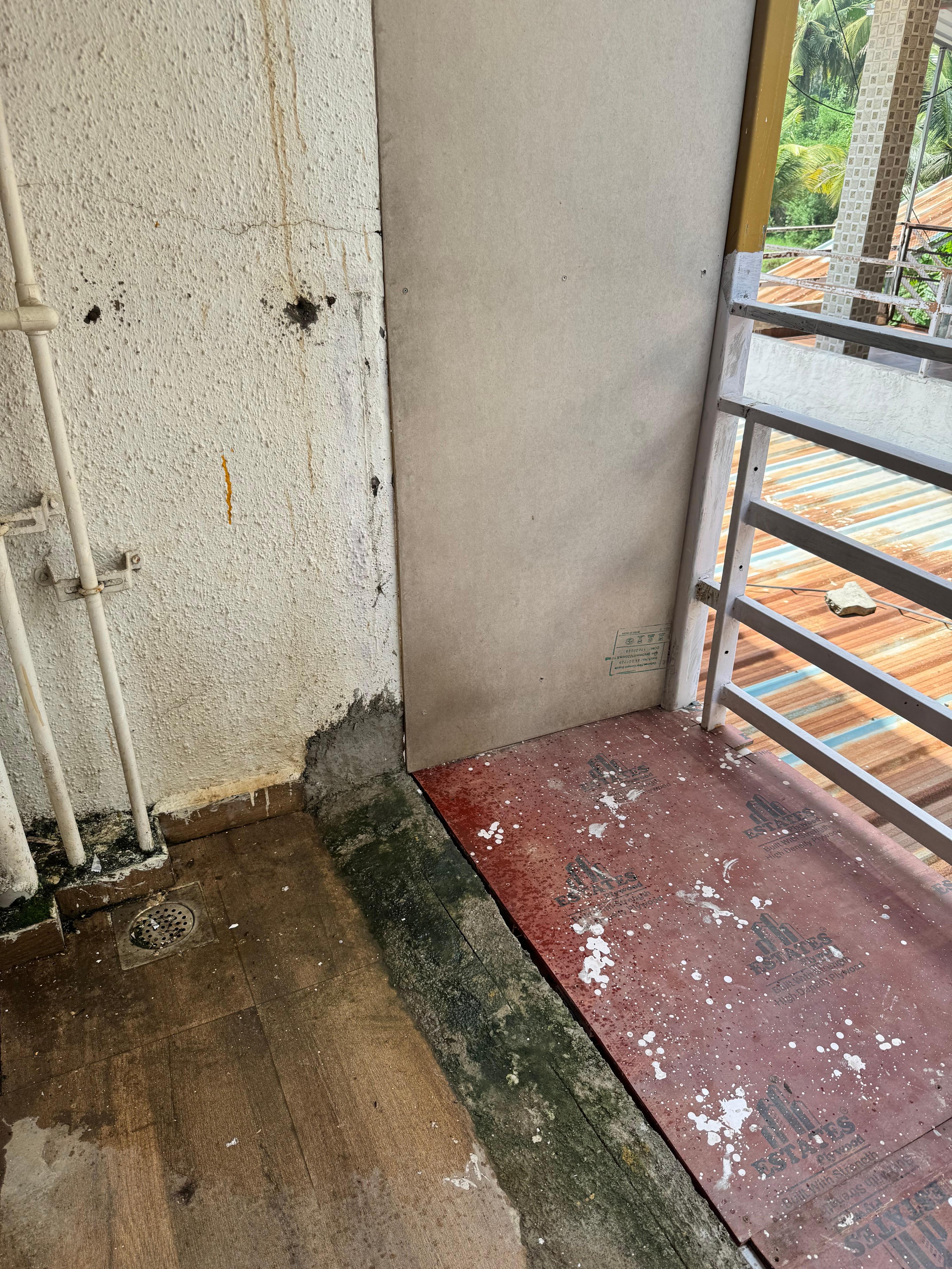 Dirty balcony and a broken balcony door