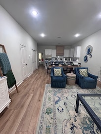 Living room, dining, and kitchen