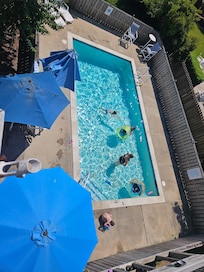 Some the family poolside, pic from top floor balcony!