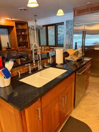 Spacious kitchen overlooking the open living room and dining area