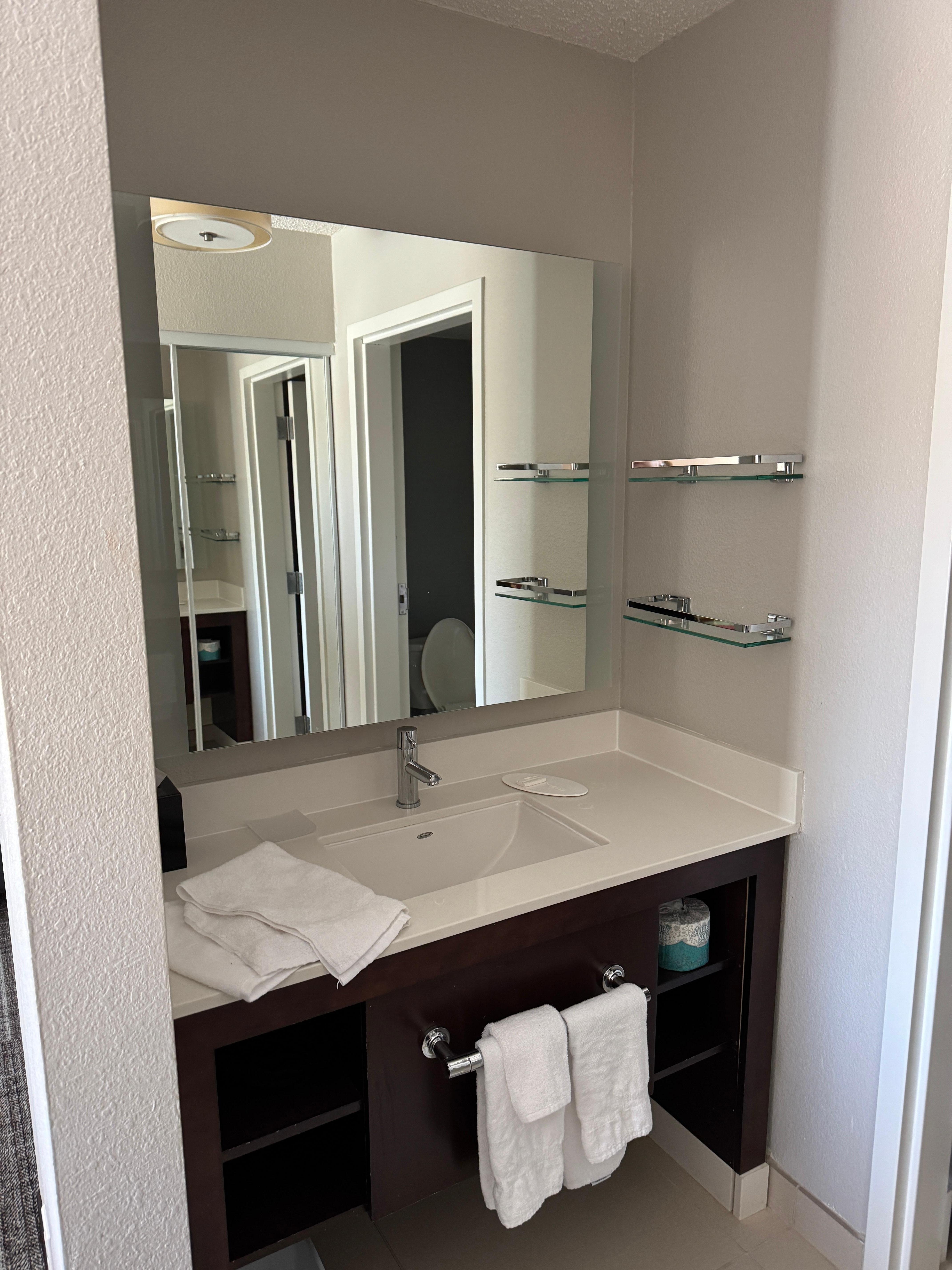 Nice vanity with shelves to the side