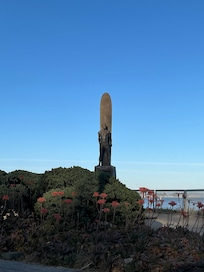 Statue near lighthouse, short drive from hotel