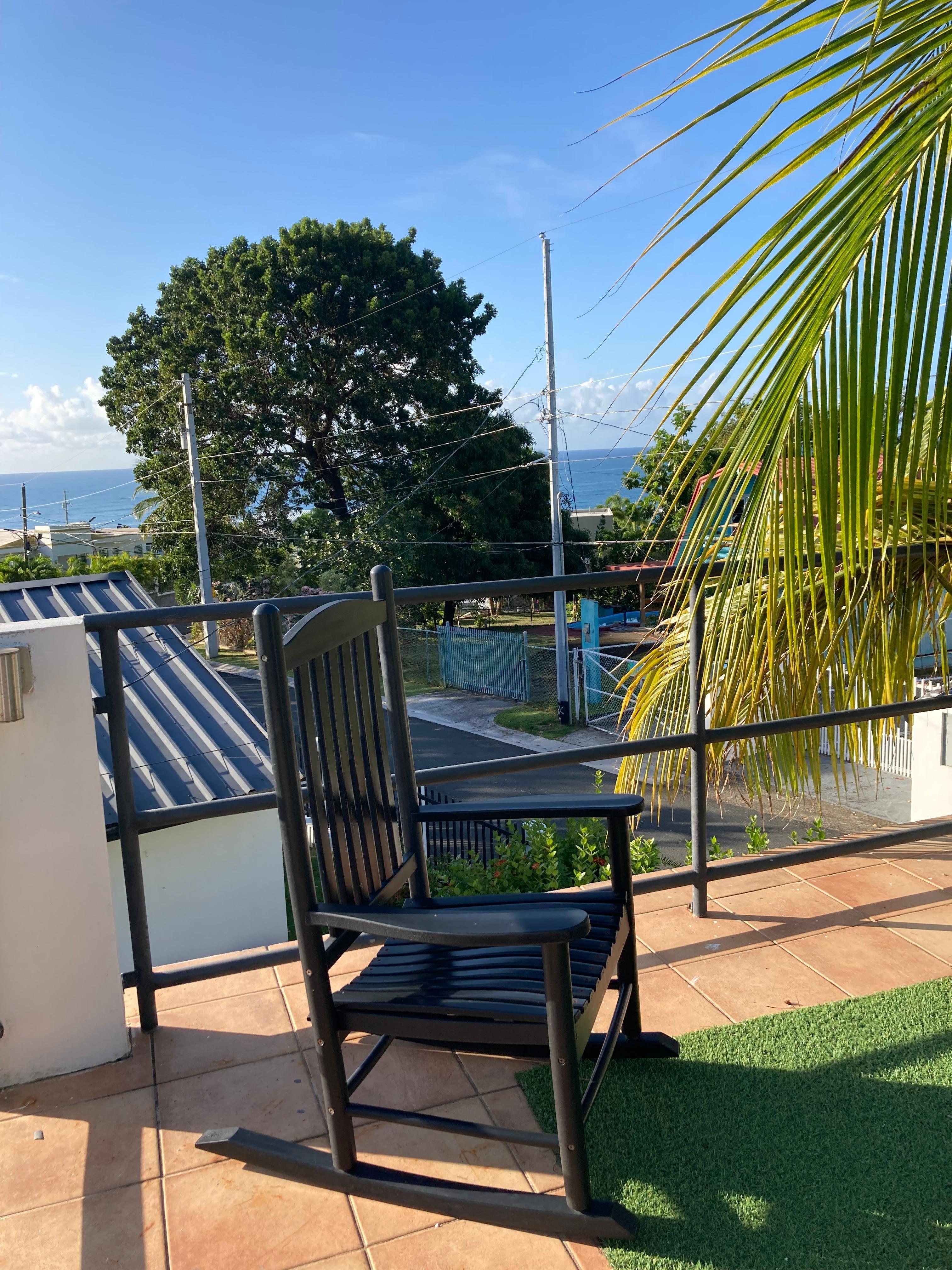 Glimpse of the ocean from the roof of the pavilion by the pool