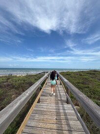 On the walkway to the beach