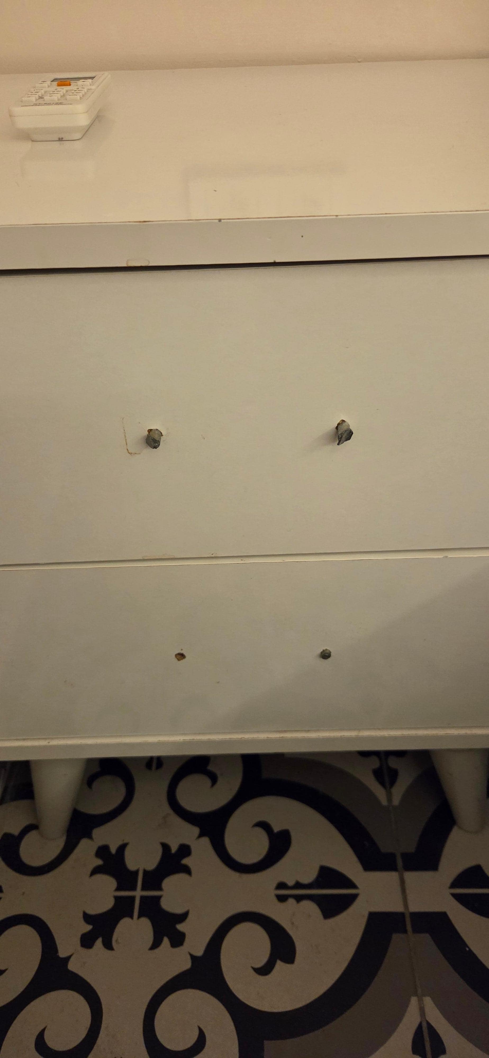 No handles on bedside table.