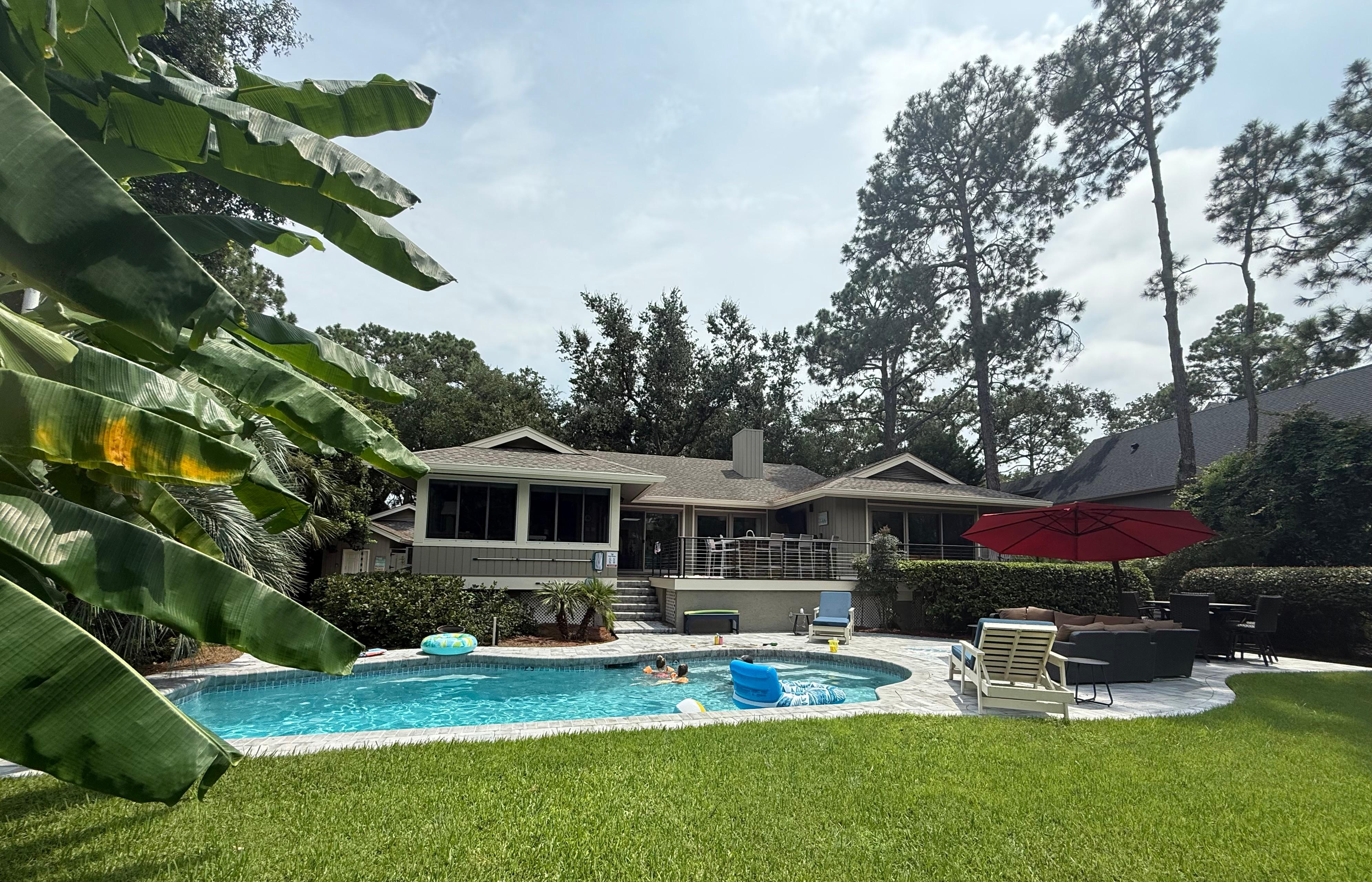 Beautiful pool area and back yard. 