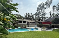 Beautiful pool area and back yard.