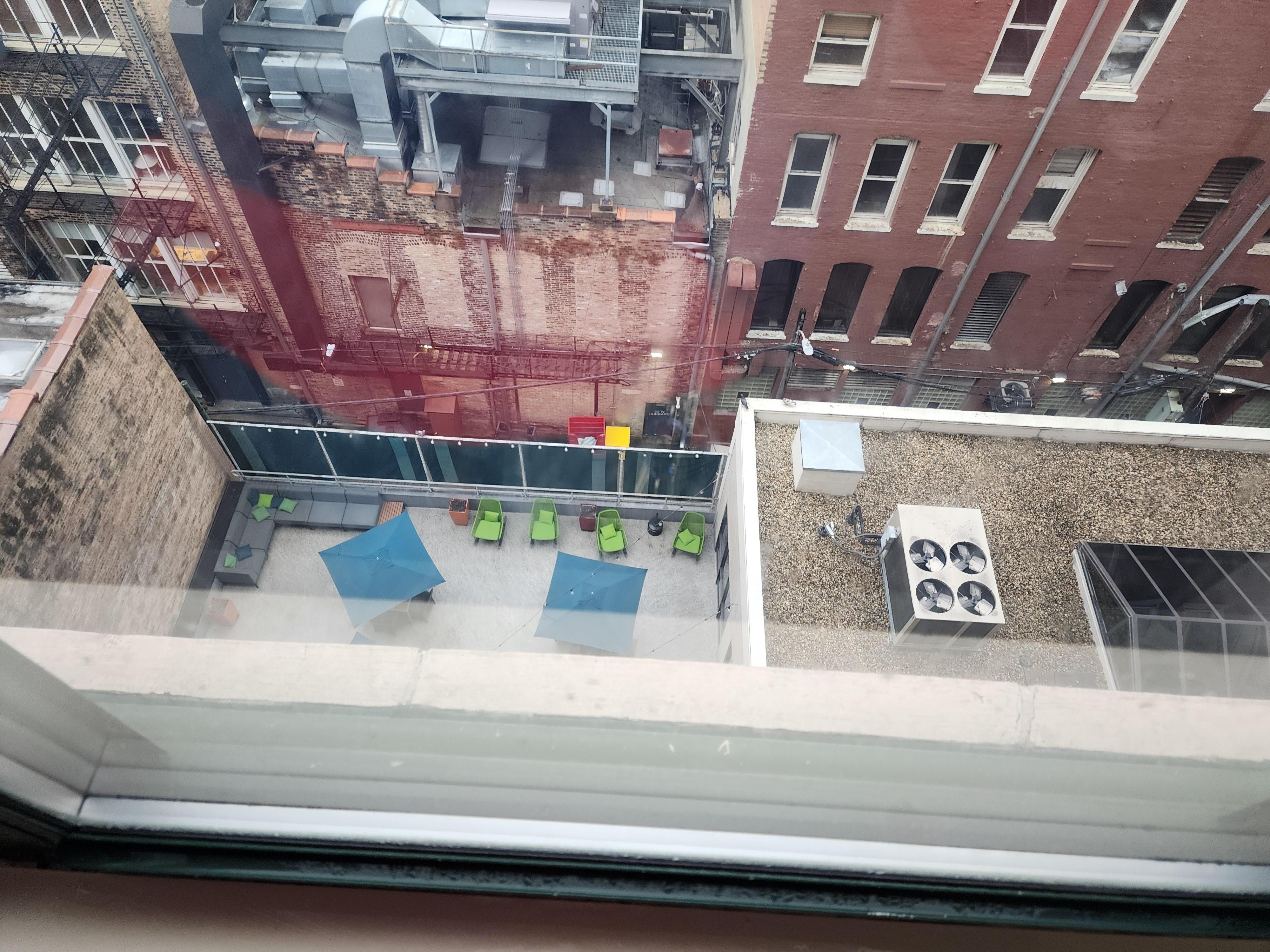 Room view of the terrace next to the indoor pool