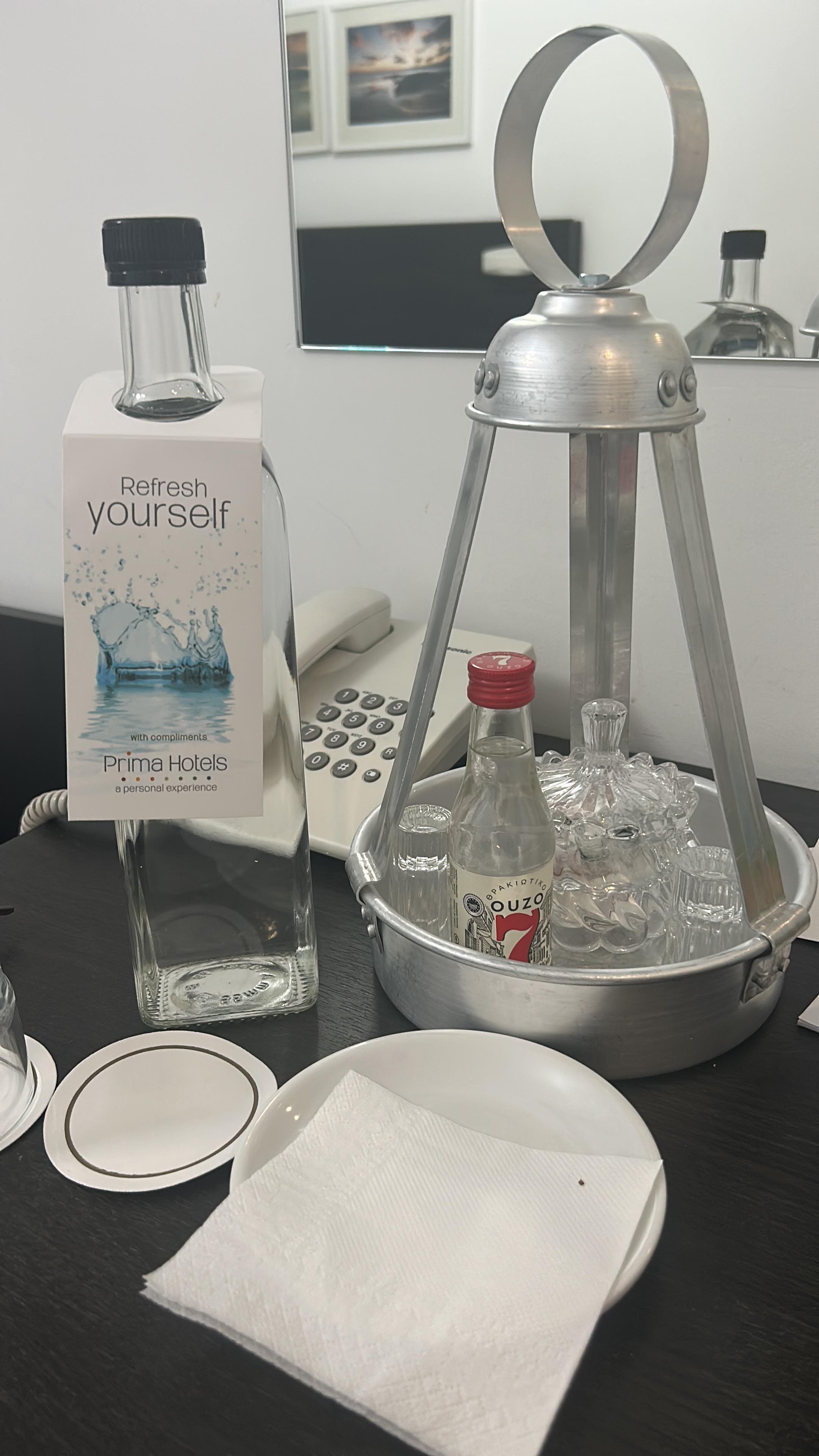 Complimentary daily mineral water and a small bottle of ouzo