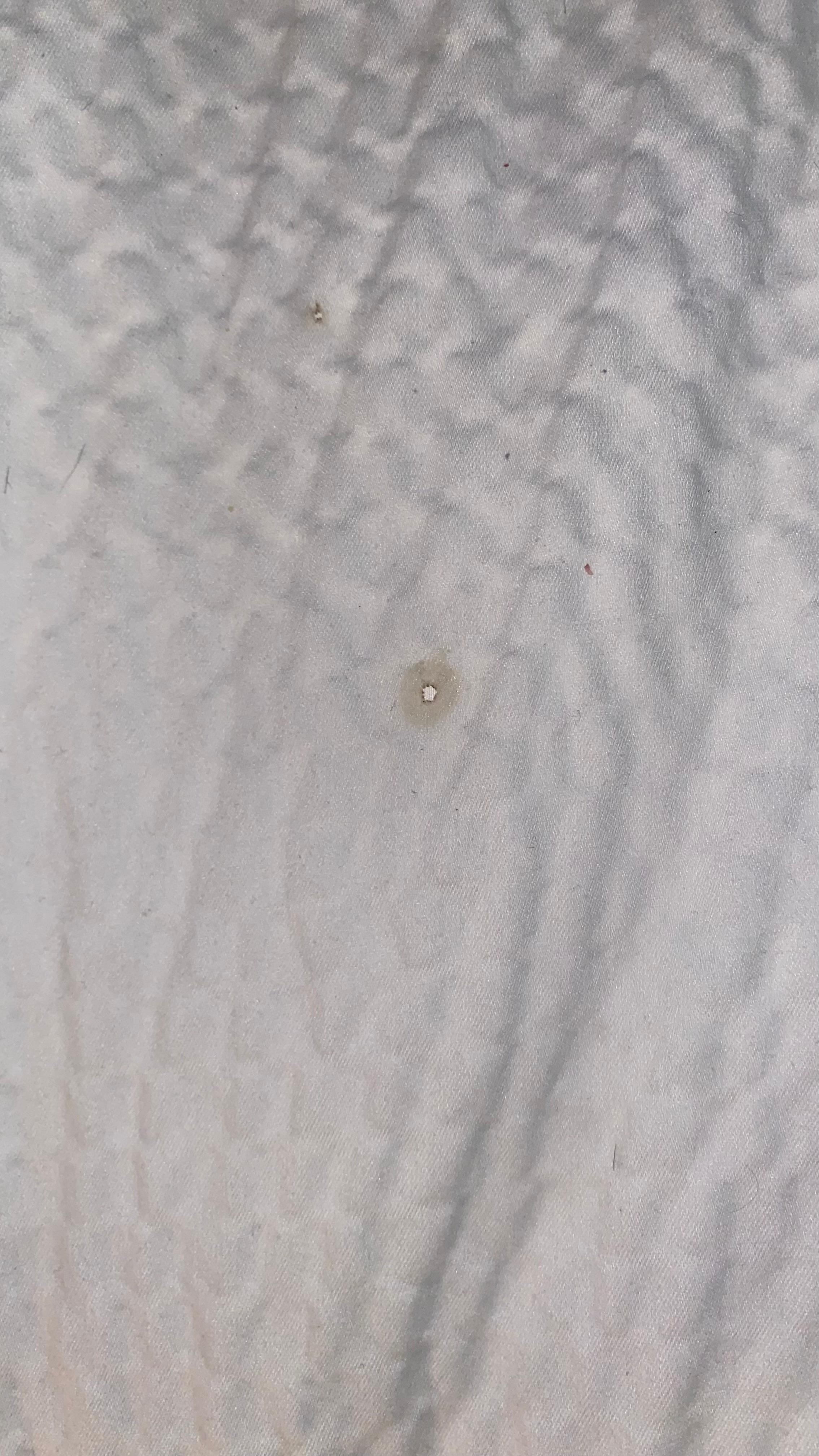 Burnt hole in sheets