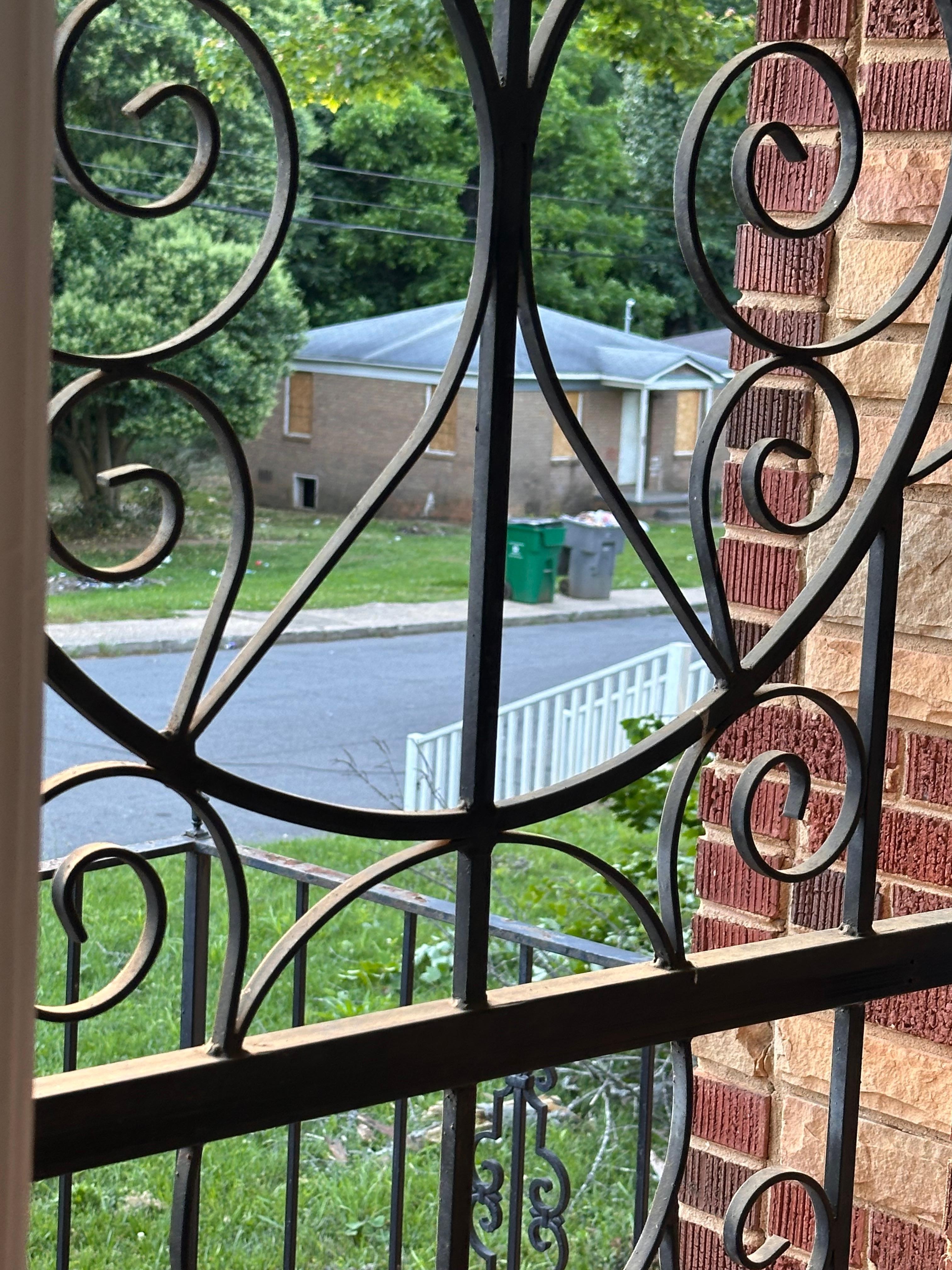 This was not the only abandoned house with caution tape around it. People were sitting out side waiting for cars to drive up
