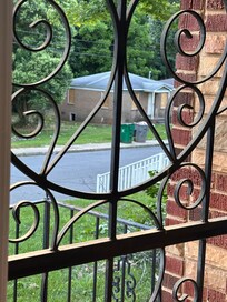 This was not the only abandoned house with caution tape around it. People were sitting out side waiting for cars to drive up