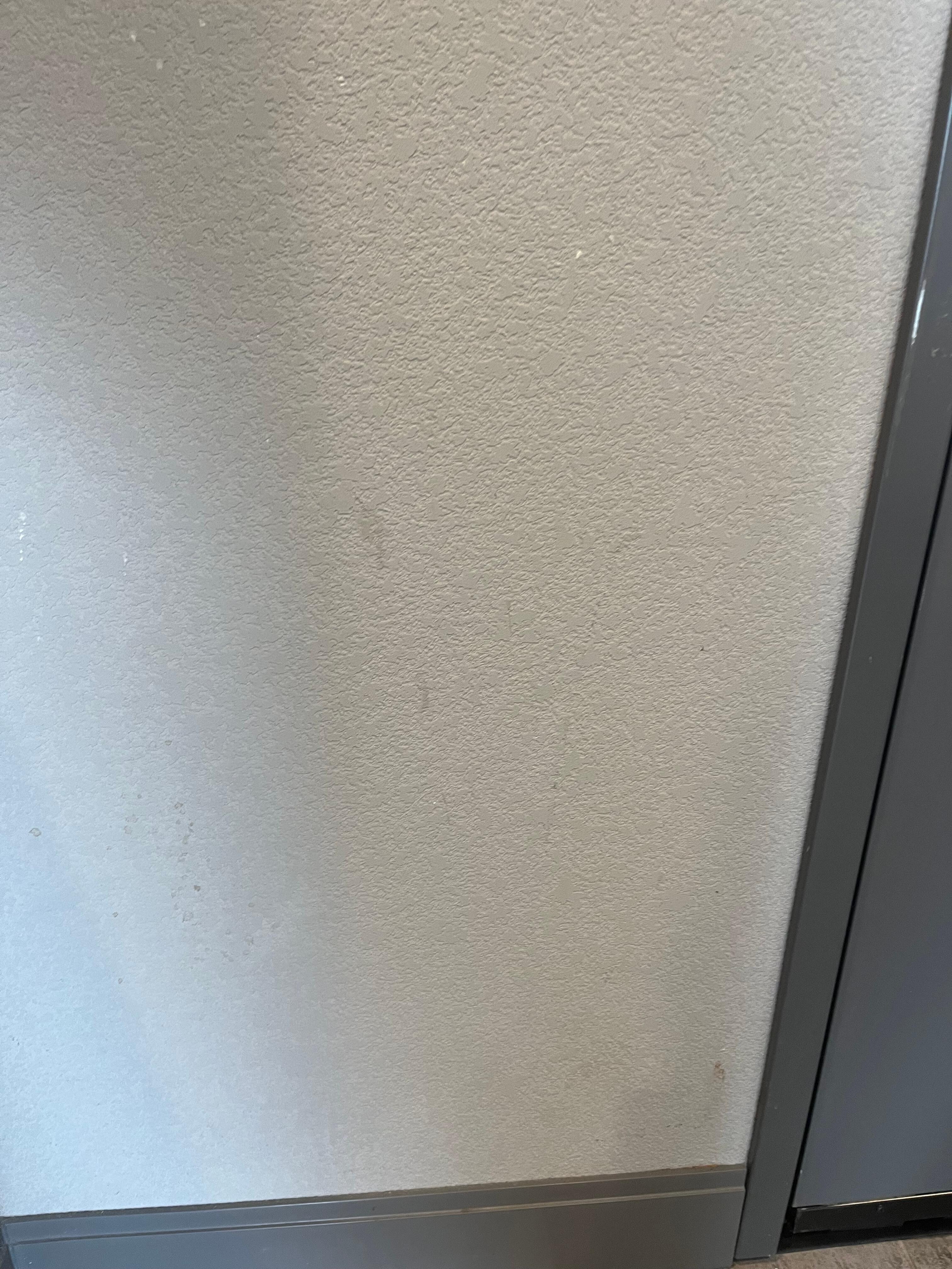 Spatters on the wall right by the front door