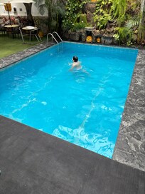 My autism son enjoying the pool.