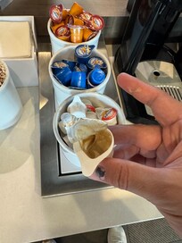 I attempted to add half-and-half to my coffee; however, it appeared that there was an issue with the cream, as it did not seem to be in proper condition.