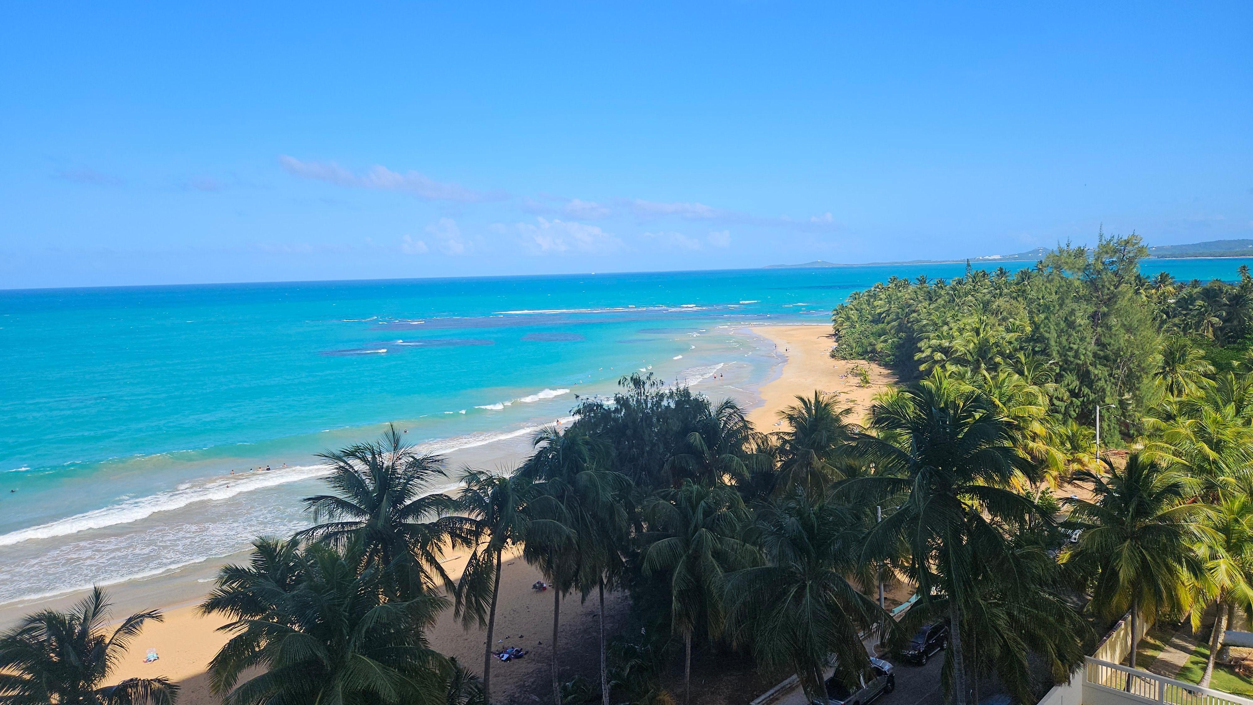 View from balcony and beach across street.