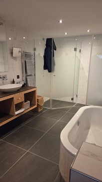 Bathroom that is completely open to the room.