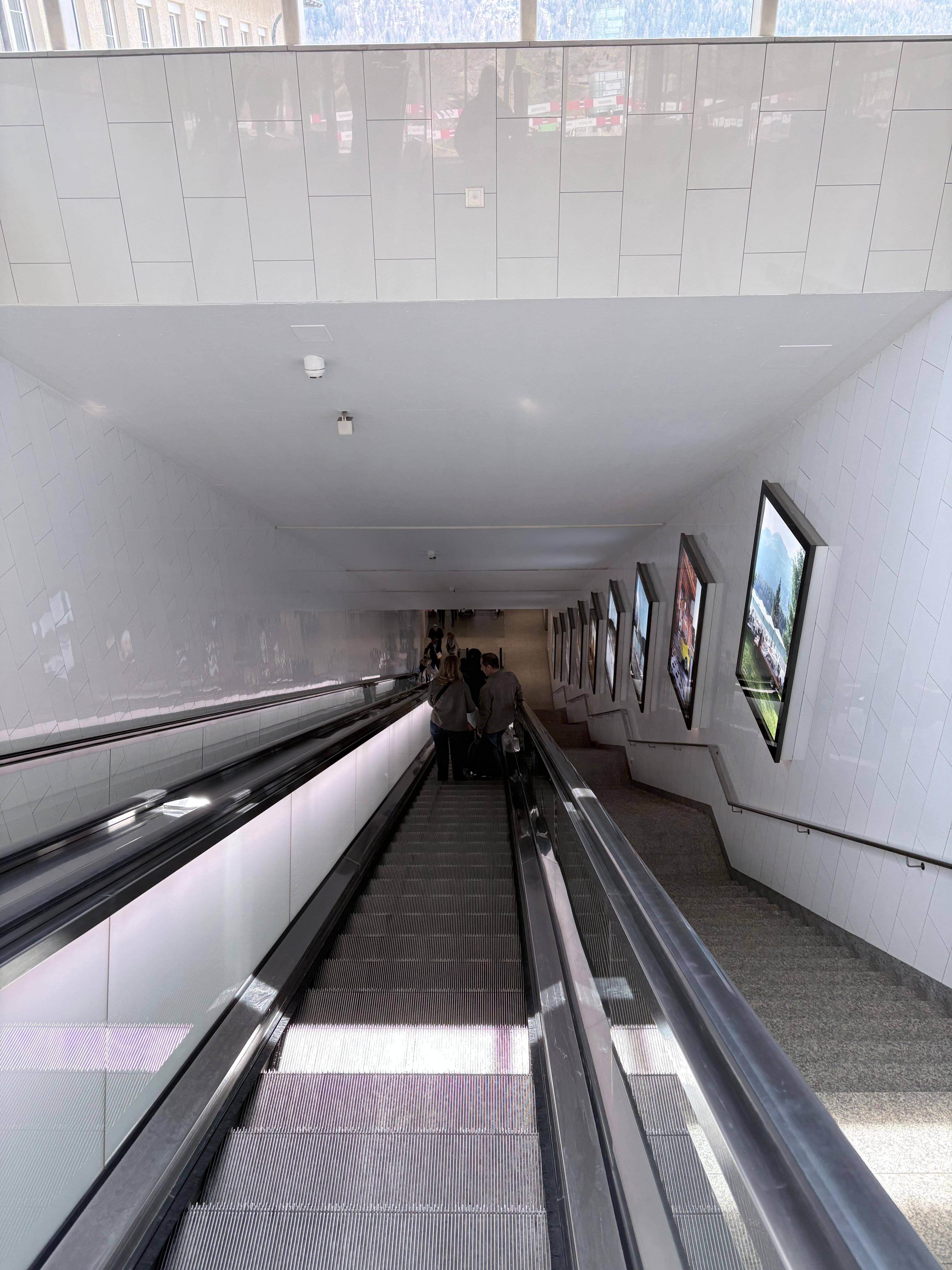 looooong escalator  to save the steep walk up to town