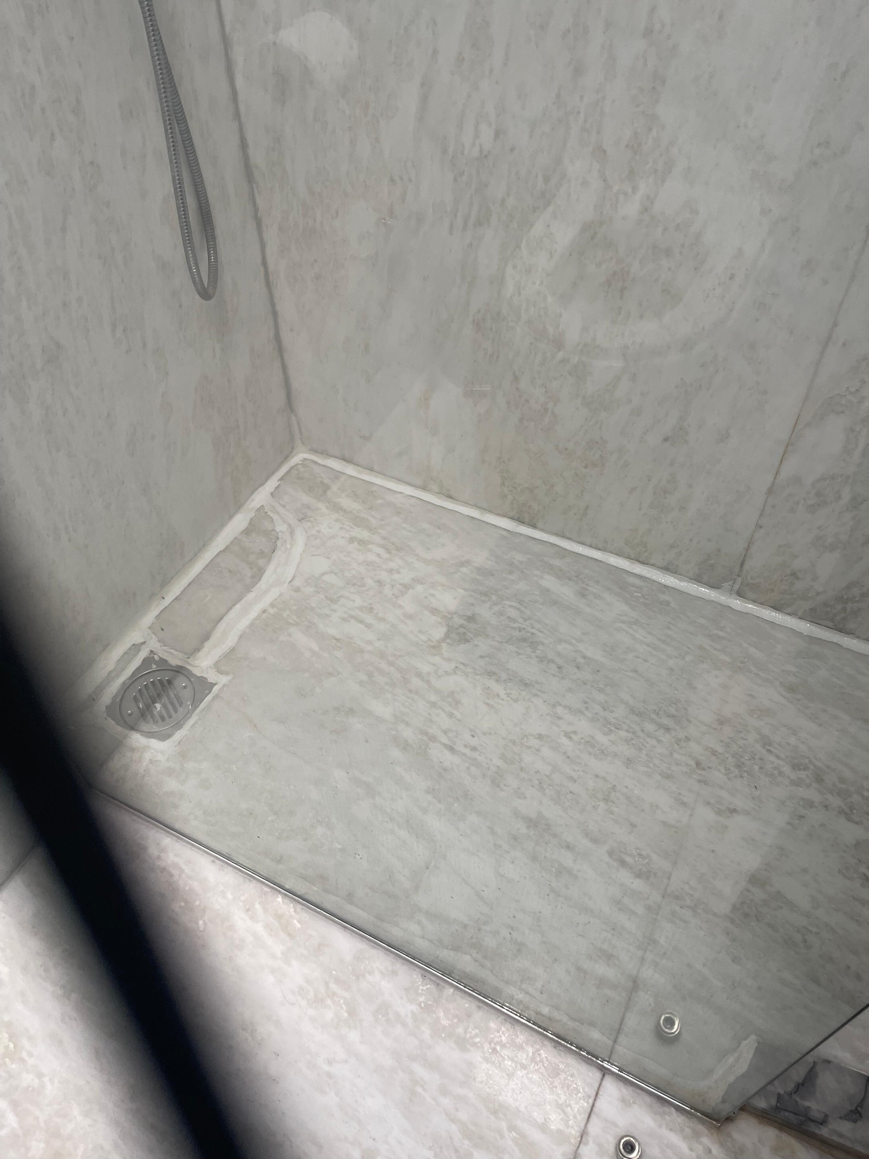 Cracks in shower leading to leaks in living room 