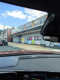 Liquor store on the corner across from property