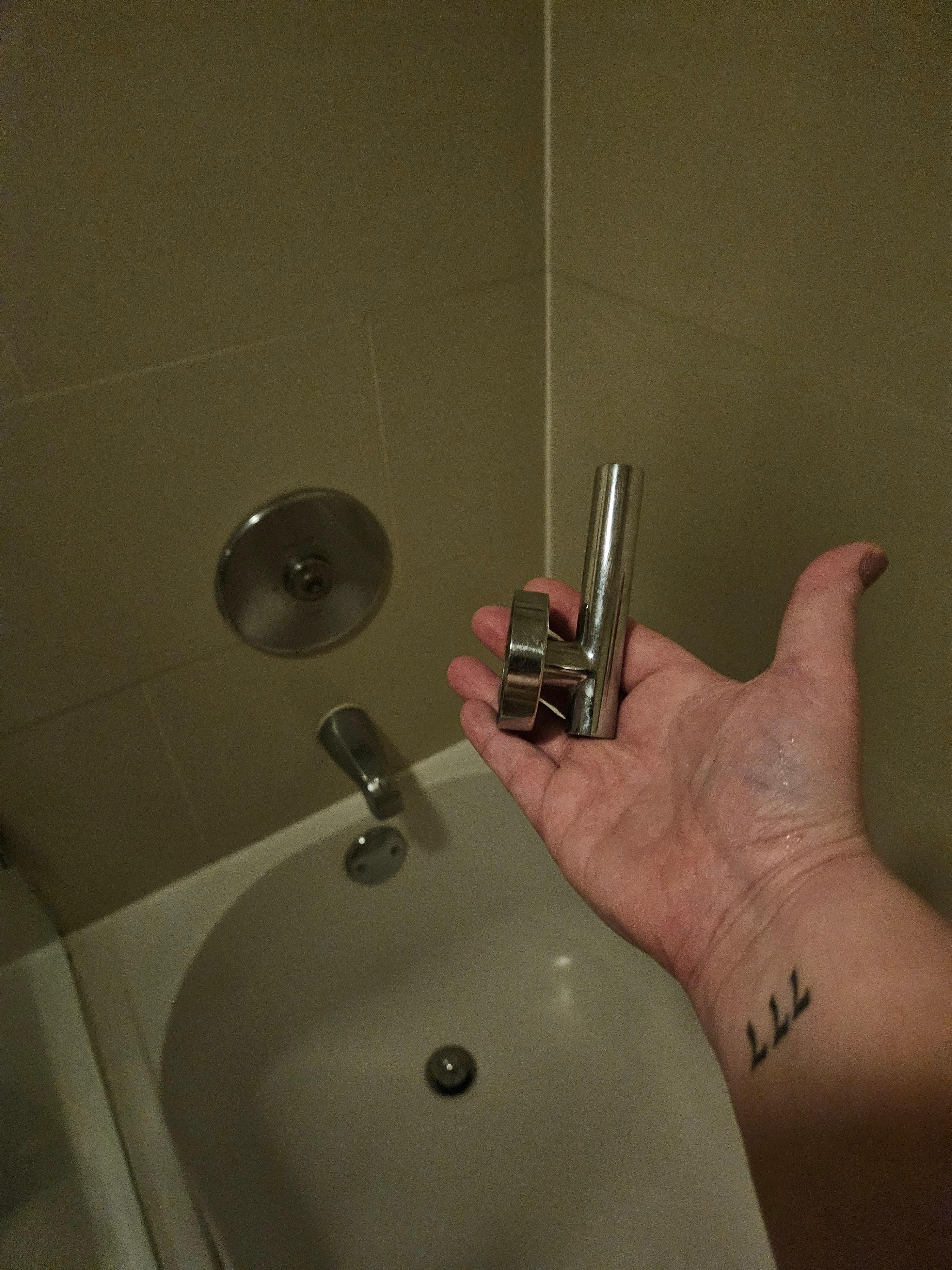 Shower handle that flew off as soon as there was water pressure