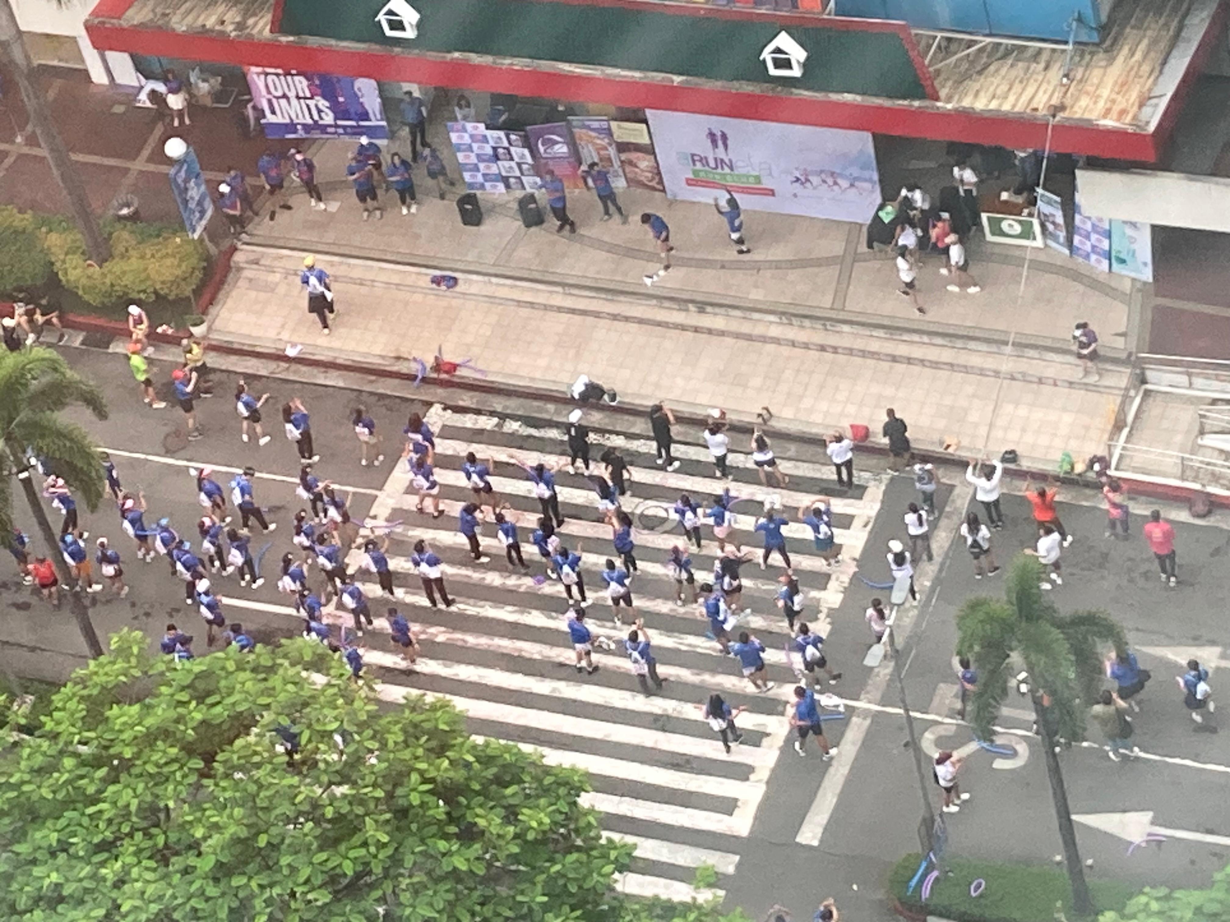 Employees exercising before work at a local business