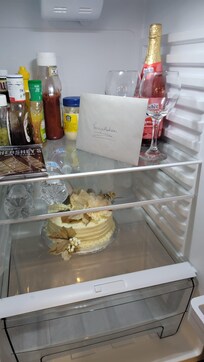 Homemade wedding cake and bubbly from our hosts.