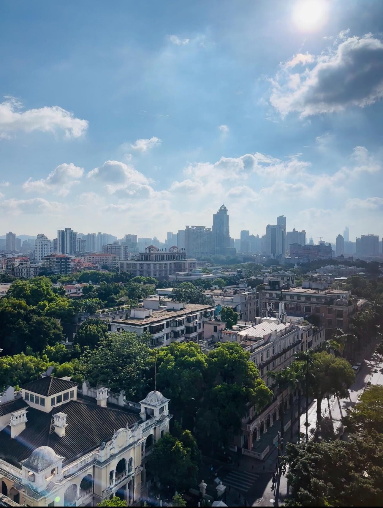 The urban scenery visible from the room's window