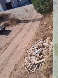 Rubbish dumped next to property