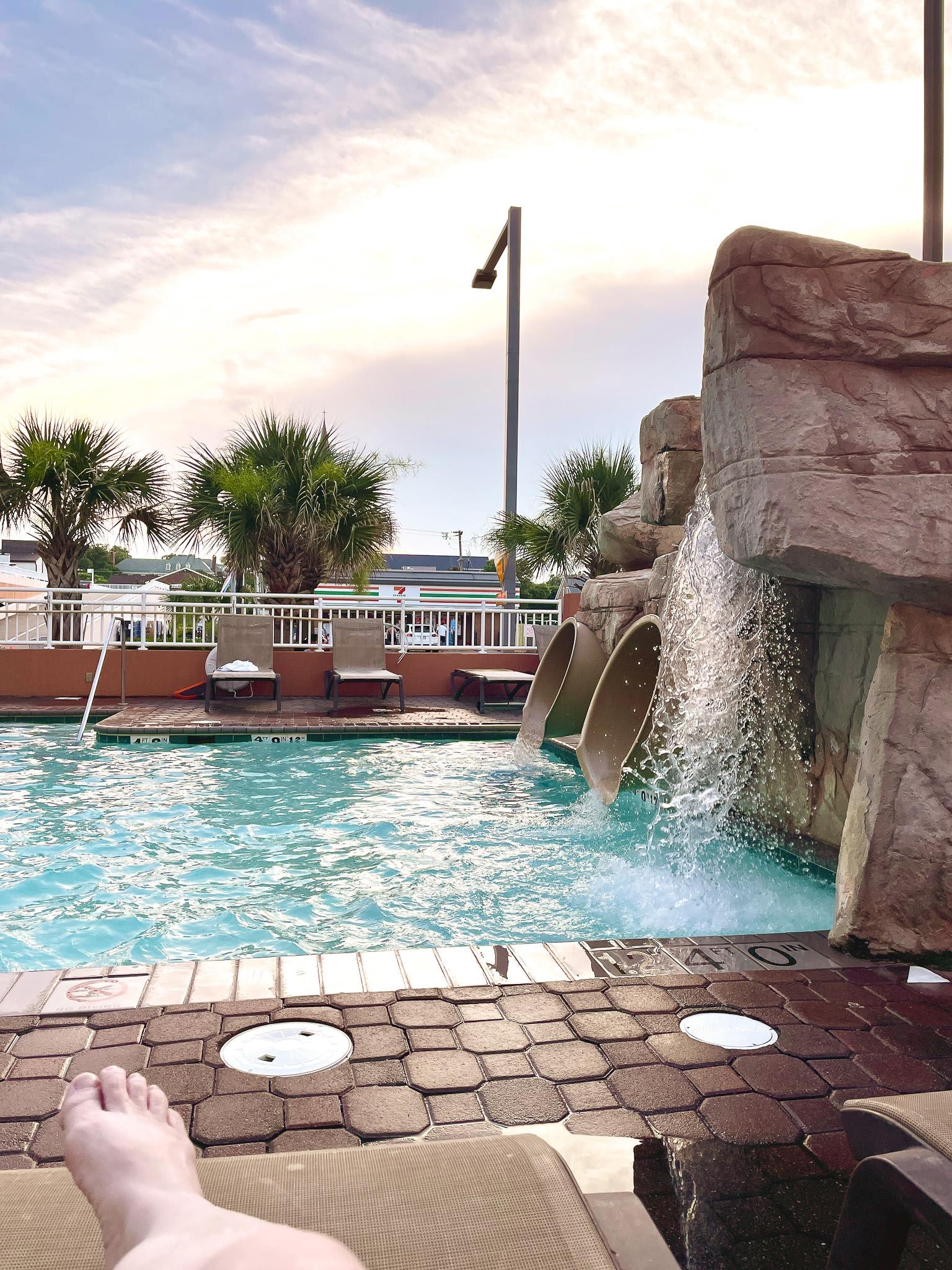 Second outdoor pool thatâs more family friendly than the one by the square whale. Has two water slides.