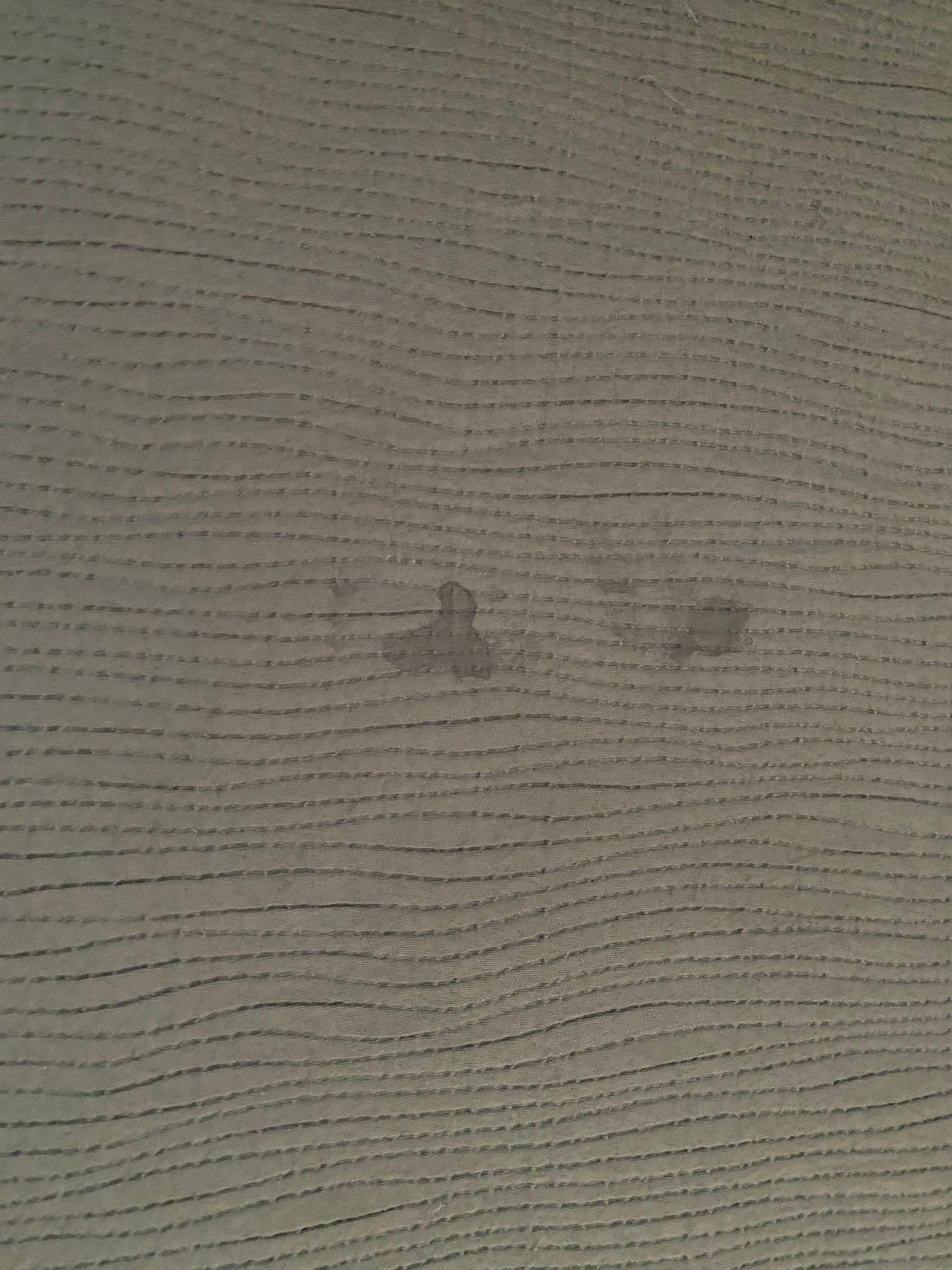 Stains in the middle of the bed duvet cover.