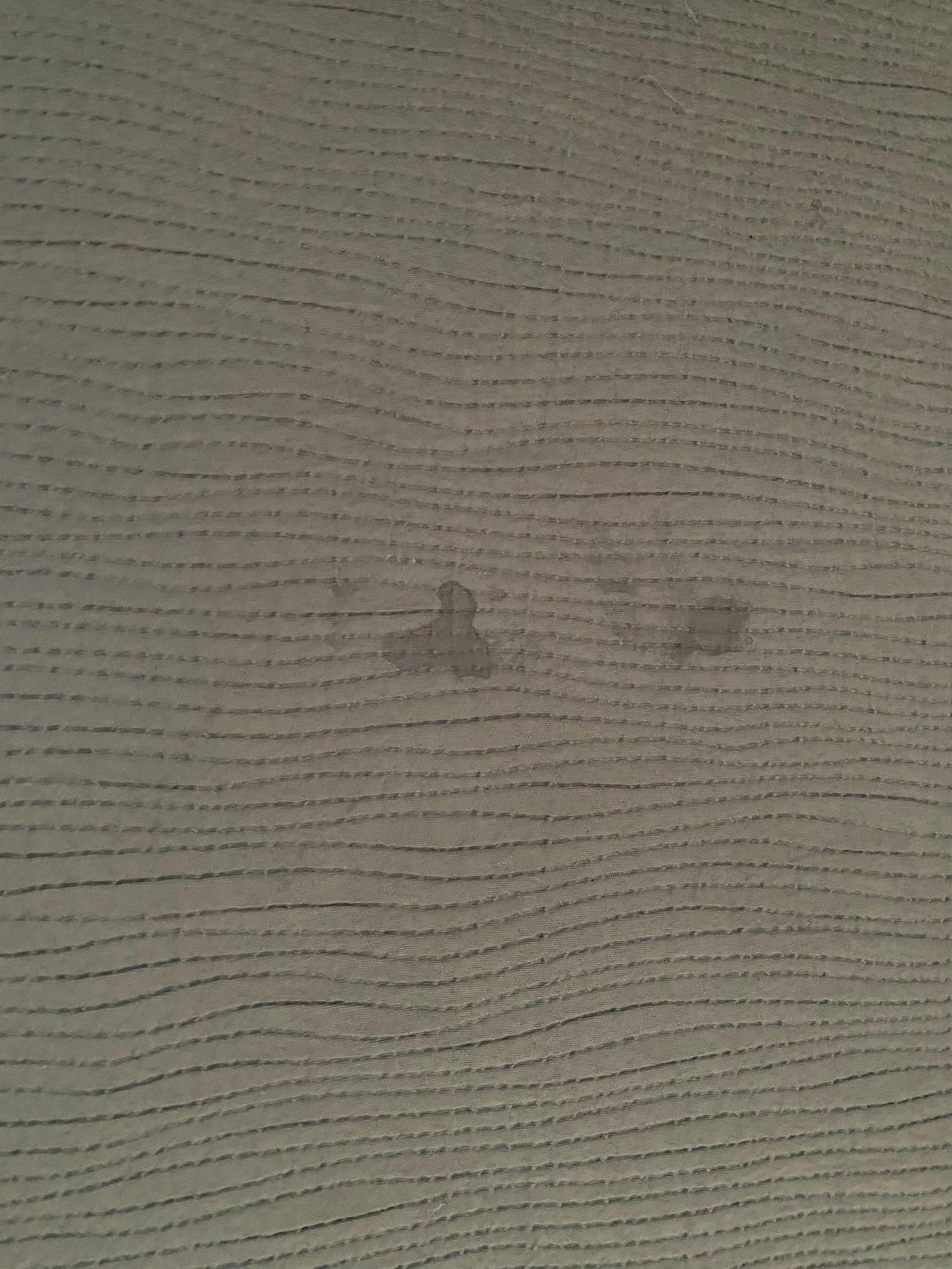 Stains in the middle of the bed duvet cover.