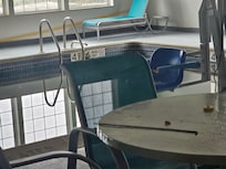 Pool water is black, brown, and green.